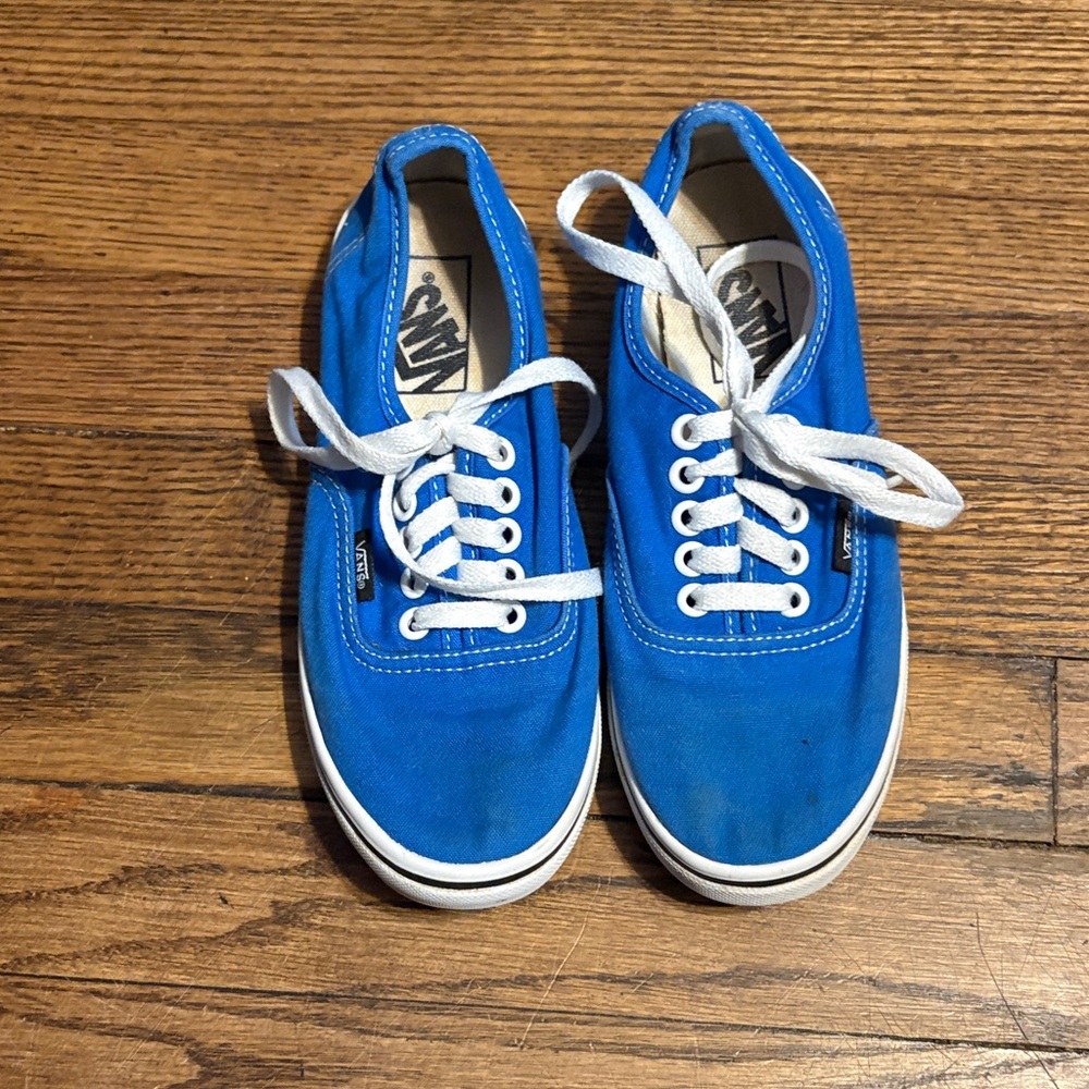 Vans Authentic sneakers in a vibrant blue color.